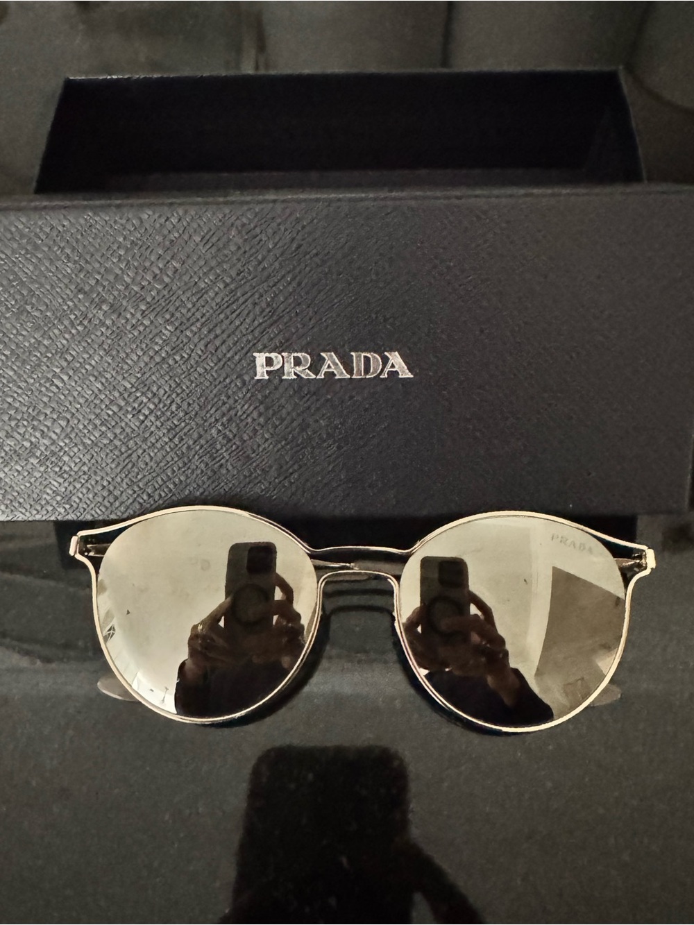 Prada Woman’s Gold Frame Sunglasses with Silver Mirrored Lenses